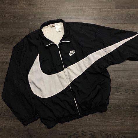 nike swoosh windbreaker jacket